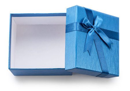 Blue gift box and lid with satin bow near it, top view, isolated on white background. File contains clipping path.の写真素材