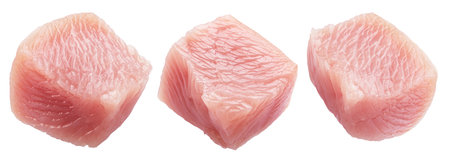 Three different raw turkey meat cubes isolated on white. File contains clipping paths.の写真素材