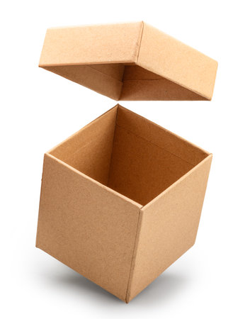 Open empty brown gift box and lid floating above a box isolated on white background. File contains clipping path.の写真素材