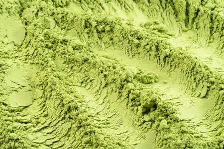Matcha tea, finely ground powder of green tea close up.