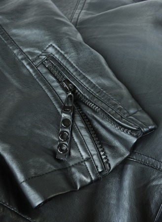 Sleeve of a leather jacket close-upの写真素材