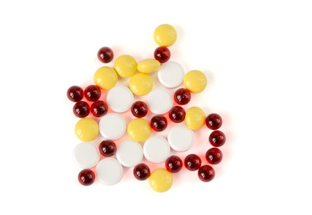 Colored pills on a white backgroundの写真素材