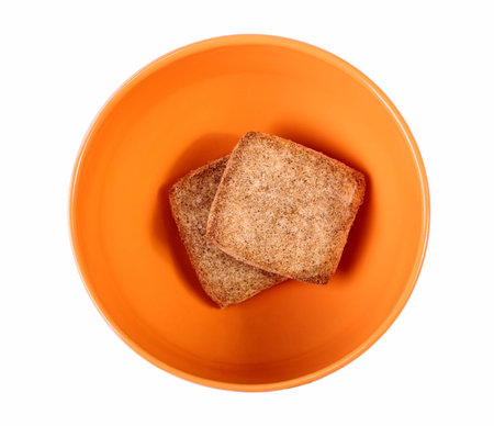 Cookies with cinnamon in an orange vase