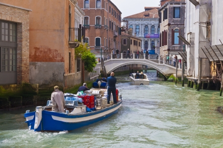 VENICE, ITALY - APRIL 27: Venice transportation, April 27, 2012 in Venice, Italy. Boats are a major part of everyday life, not just for passenger transport but for merchandise deliveries too.のeditorial素材