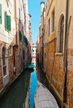 View of a narrow canal in Venice, Italyの写真素材