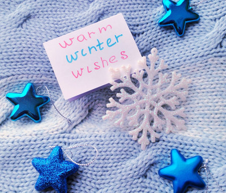 Warm winer wishes card with knitted backgroundの素材