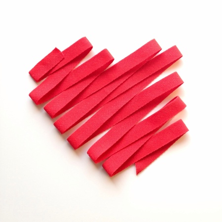 Heart geometric shape from red ribbonの素材