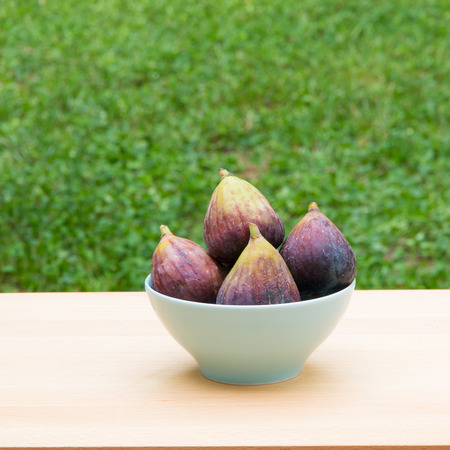 Fresh ripe figs  in bowl. Selective focusの写真素材