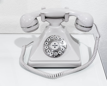 Vintage telephone on a tableの写真素材