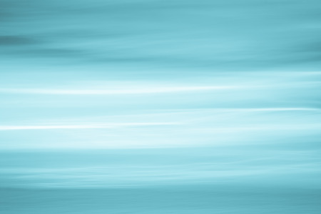 Abstract blue sky and ocean, nature background with blurred panning motion.の写真素材