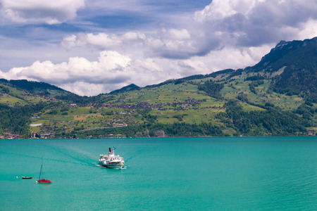 View of Thun lake with cruise ship from Spiez village,  Switzerland.の写真素材