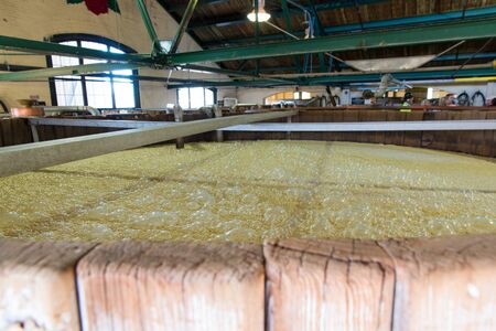 Lawrenceburg, KY, USA - November 6, 2016 : Inside tour at historic Four Roses Bourbon Distillery. Fresh corn mash bubbling and fermenting.のeditorial素材