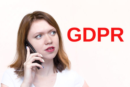 young woman on the phone with letters GDPR
