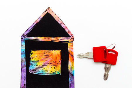 rent or buy concept. an image of a house with keysの写真素材