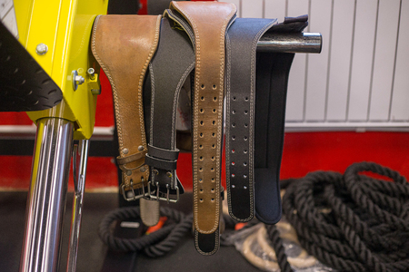 Sport equipment in a modern spacious gym. Different weights and dumbbellsの写真素材