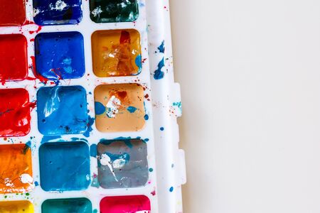 bright watercolor paints on light background. watercolor background. bright watercolor paletteの写真素材