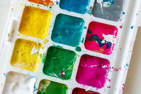 bright watercolor paints on light background. watercolor background. bright watercolor paletteの写真素材