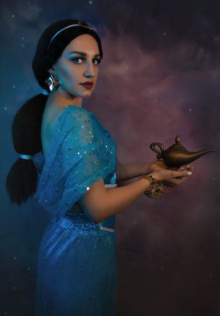 Beautiful Jasmine princess closeup with magic lamp in her hands. Art photo