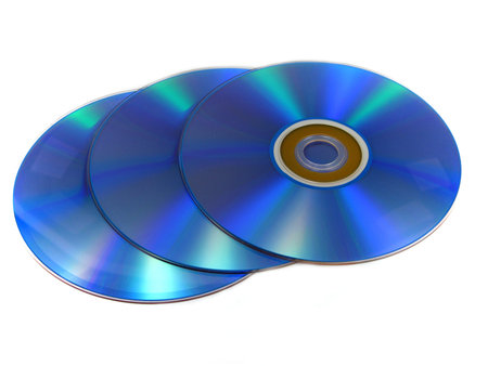 Three DVD or CD discs isolated on white