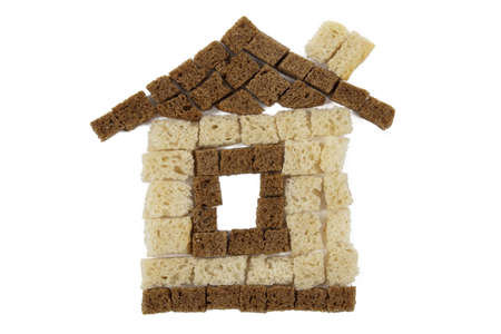 house of bread crumbs on a white backgroundの写真素材
