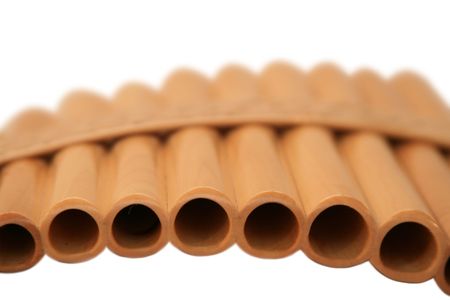 Wooden pan flute on a white background. It is isolatedの写真素材
