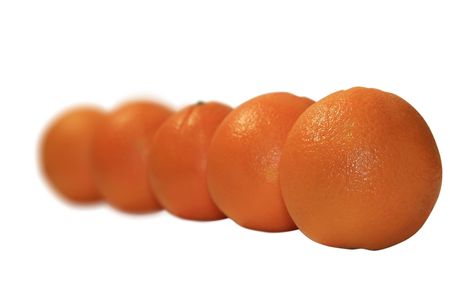 Five juicy oranges isolated on a white backgroundの写真素材