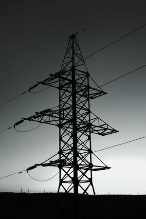 Silhouette of a column electric transfers on a background of a declineの写真素材