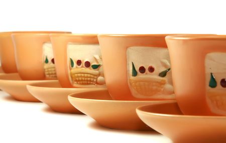 Gift tea service of brown color on a white backgroundの写真素材