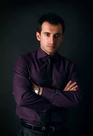 young man on a black backgroundの写真素材