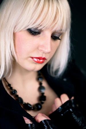 series of images with the beautiful blonde in a dark suit