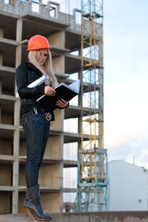 series. The young girl in a helmet before buildingの写真素材