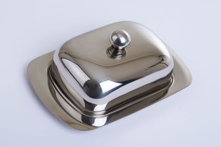 Series. Stainless butterdish on a white backgroundの写真素材