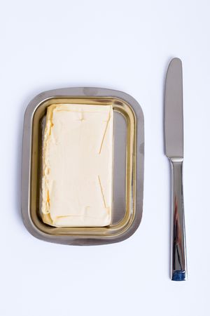 Series. Stainless butterdish on a white backgroundの写真素材