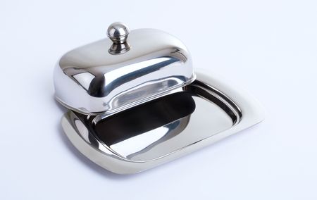 Series. Stainless butterdish on a white backgroundの写真素材