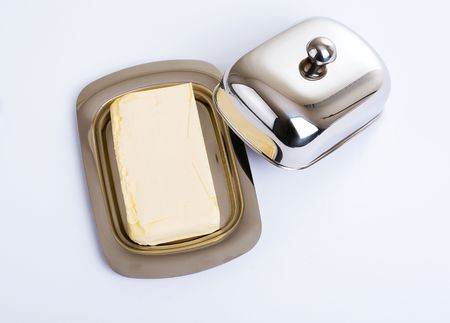 Series. Stainless butterdish on a white backgroundの写真素材