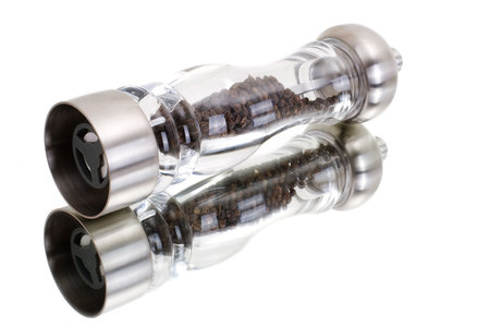 A series. A glass grinder of pepper isolated on a white backgroundの写真素材