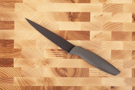 Series. kitchen knife isolated on wooden backgroundの写真素材