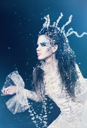 Series. Beautiful brunette in a dress of Snow Queenの写真素材
