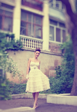 Very beautiful brunette in a wedding dress. Rero styleの写真素材