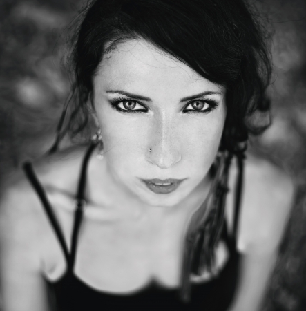 Portrait of a young slim girl. Training on the beachの写真素材