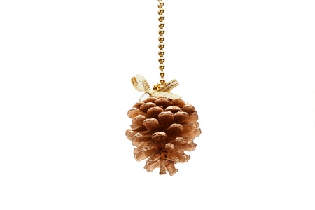 Christmas-tree decoration - a cone isolated on whiteの写真素材