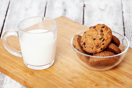 Cup of milk and cookiesの写真素材