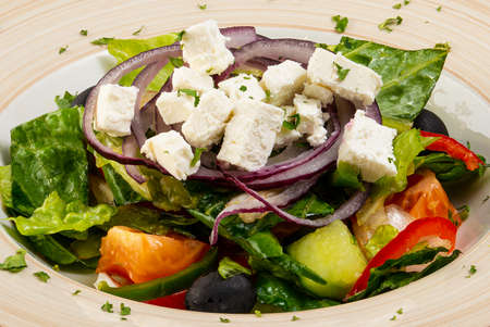 Greek salad on a plate closeupの写真素材