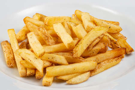 French fries on a white plateの写真素材