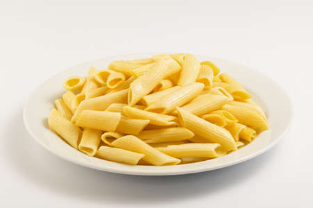 Italian pasta on a white plateの写真素材