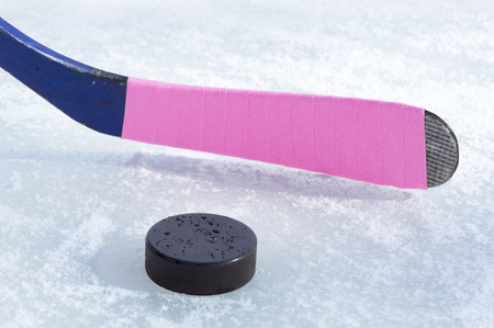 ice hockey stick and puckの写真素材