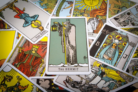 Tarot cards Tarot, the hermit card in the foreground.の写真素材