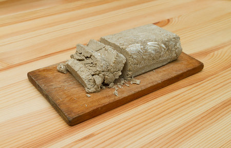 Halva on the chalkboard on the wooden table.