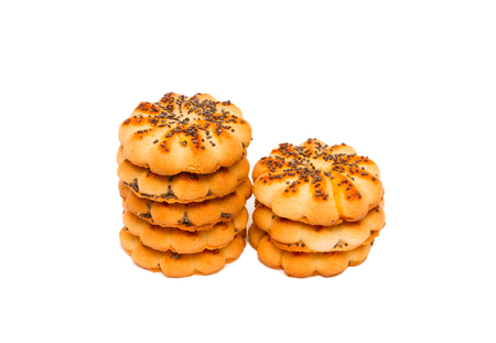 Round sugar cookies with poppy seeds isolated on a white background.の写真素材