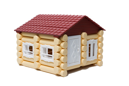 Model wooden houses made of logs are isolated on a white background.の写真素材